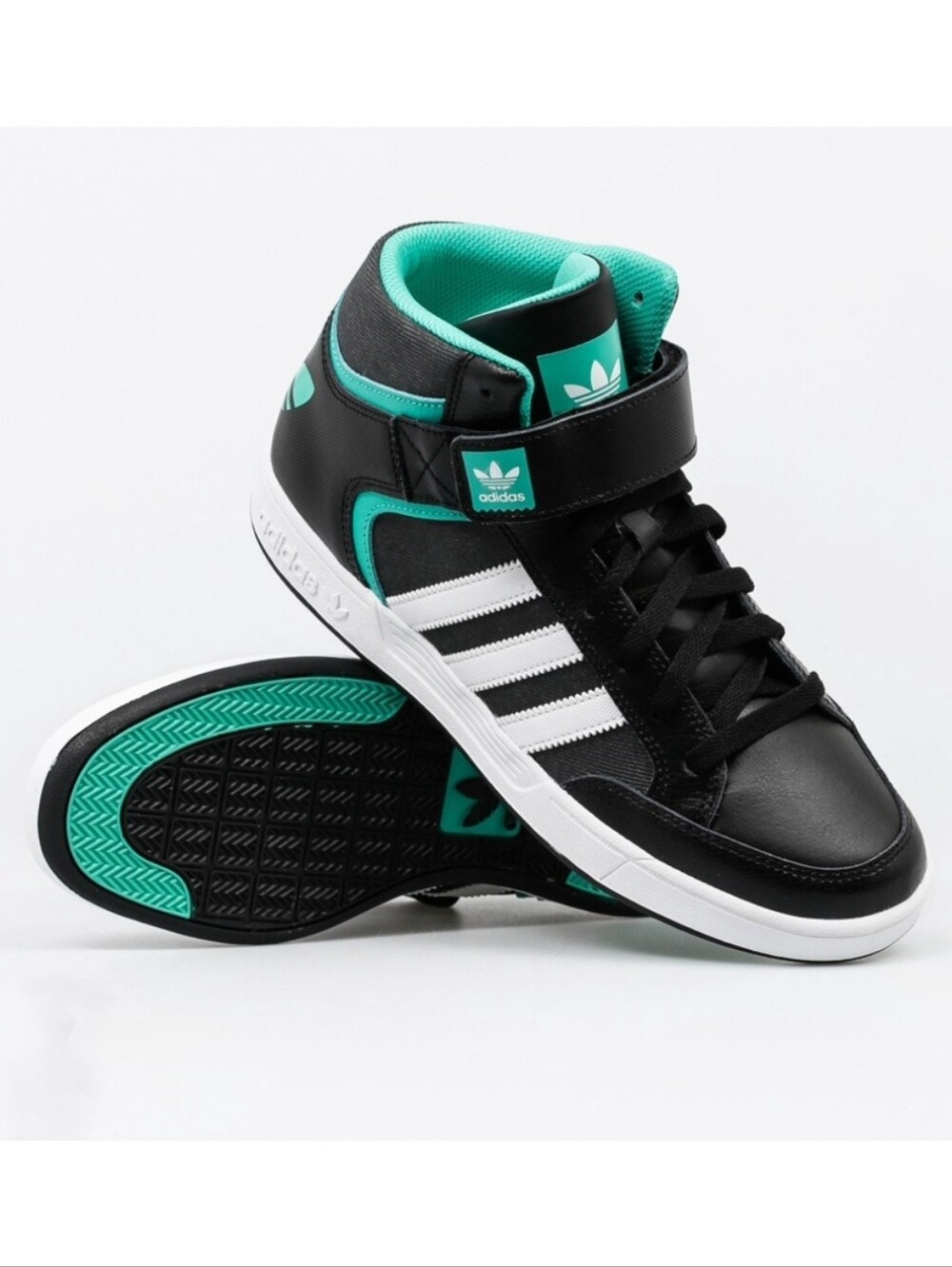 Adidas Varial Mid black and green sneakers. Size 9.5. Great condition.